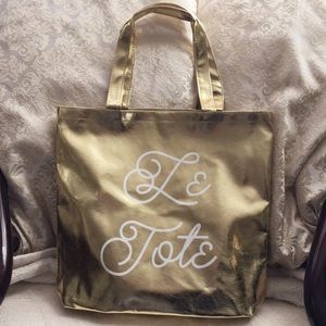 NEW! “Le Tote” metallic gold tote